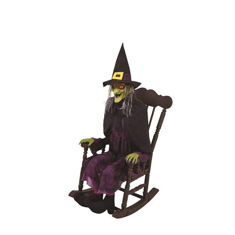 Halloween witch relaxing in a rocking chair